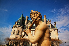 Flute playing statue